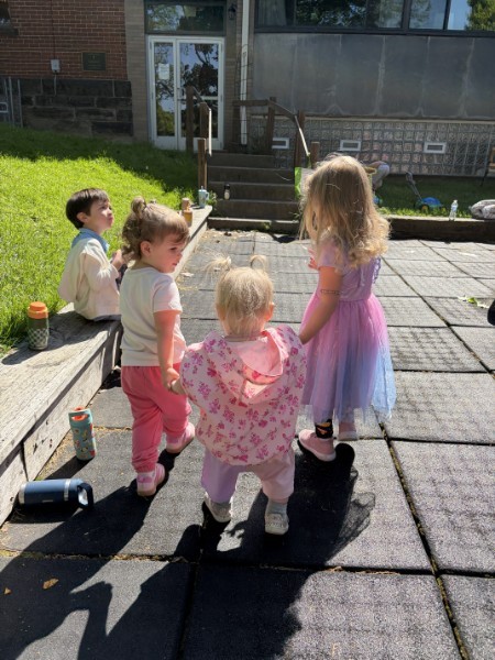 Big kids reading with the littles