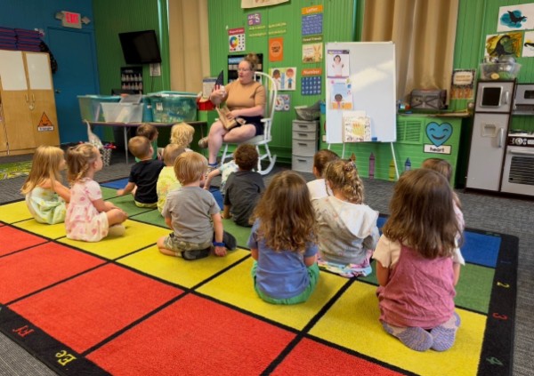 Preschool class working on a project together