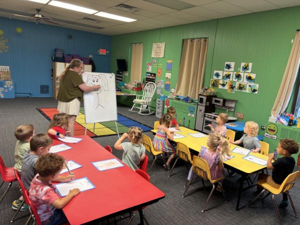 Preschoolers playing a guided learning game